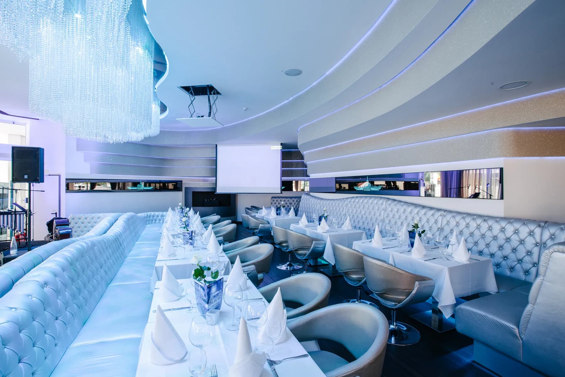 Main hall of the MIO event venue at Alexanderplatz with LED chandelier