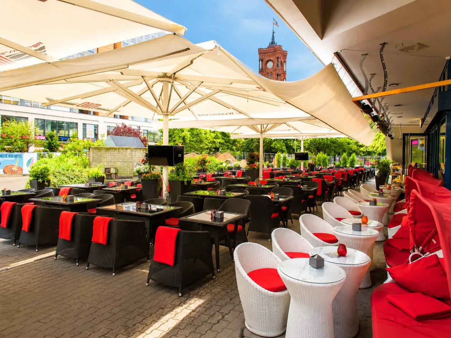 The huge terrace of MIO Berlin at Alexanderplatz with a direct view of the Rotes Rathaus, beneath the TV Tower